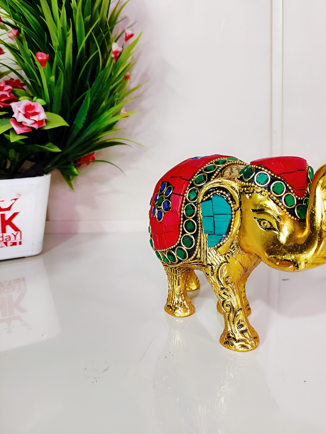 

Kridaykraft Gold toned & Red Metal Medium Idol Showpiece