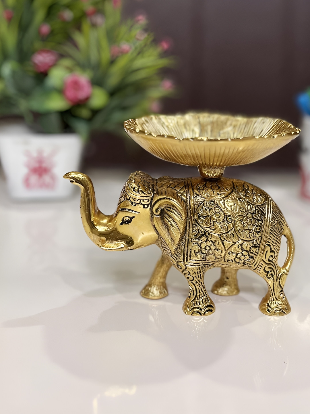 

Kridaykraft Gold-Toned Metal Small Elephant Bowl Showpiece