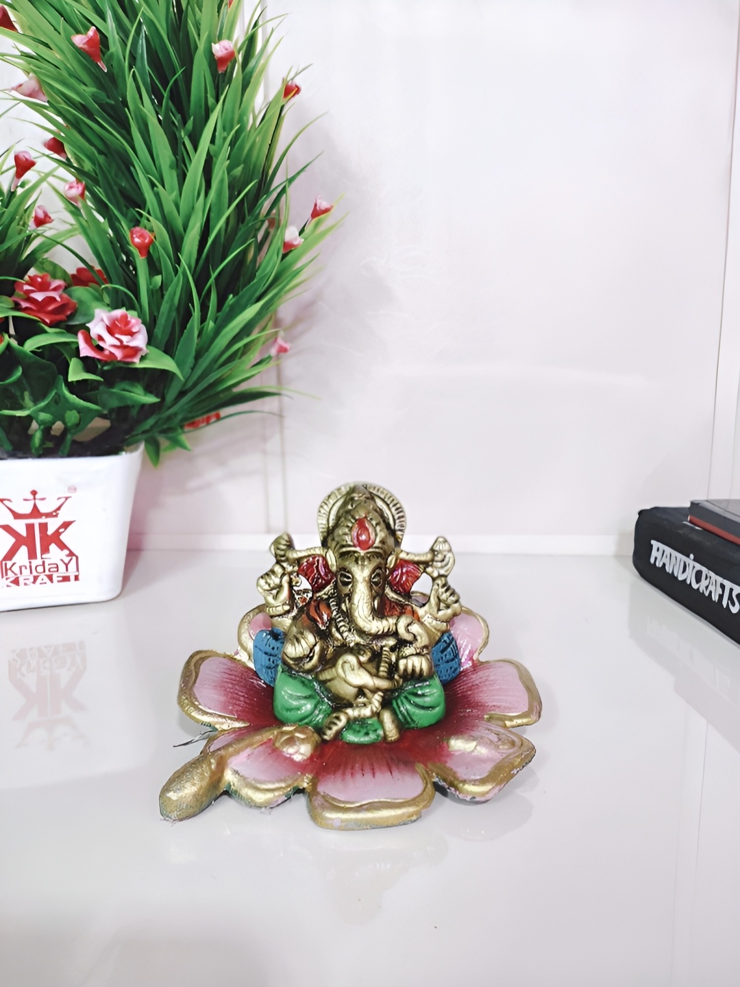 

Kridaykraft Bronze Toned & Red Lord Ganesha Religious Idol Showpiece