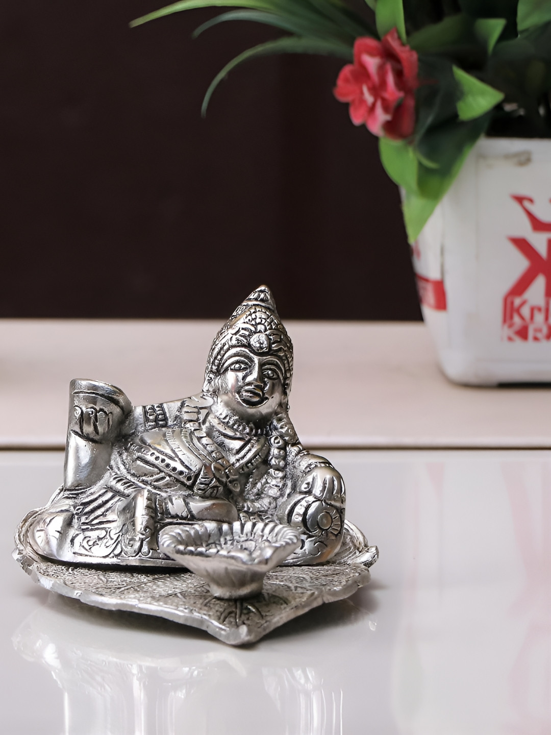 

Kridaykraft Silver-Toned Kuberdiya Deepam Showpiece