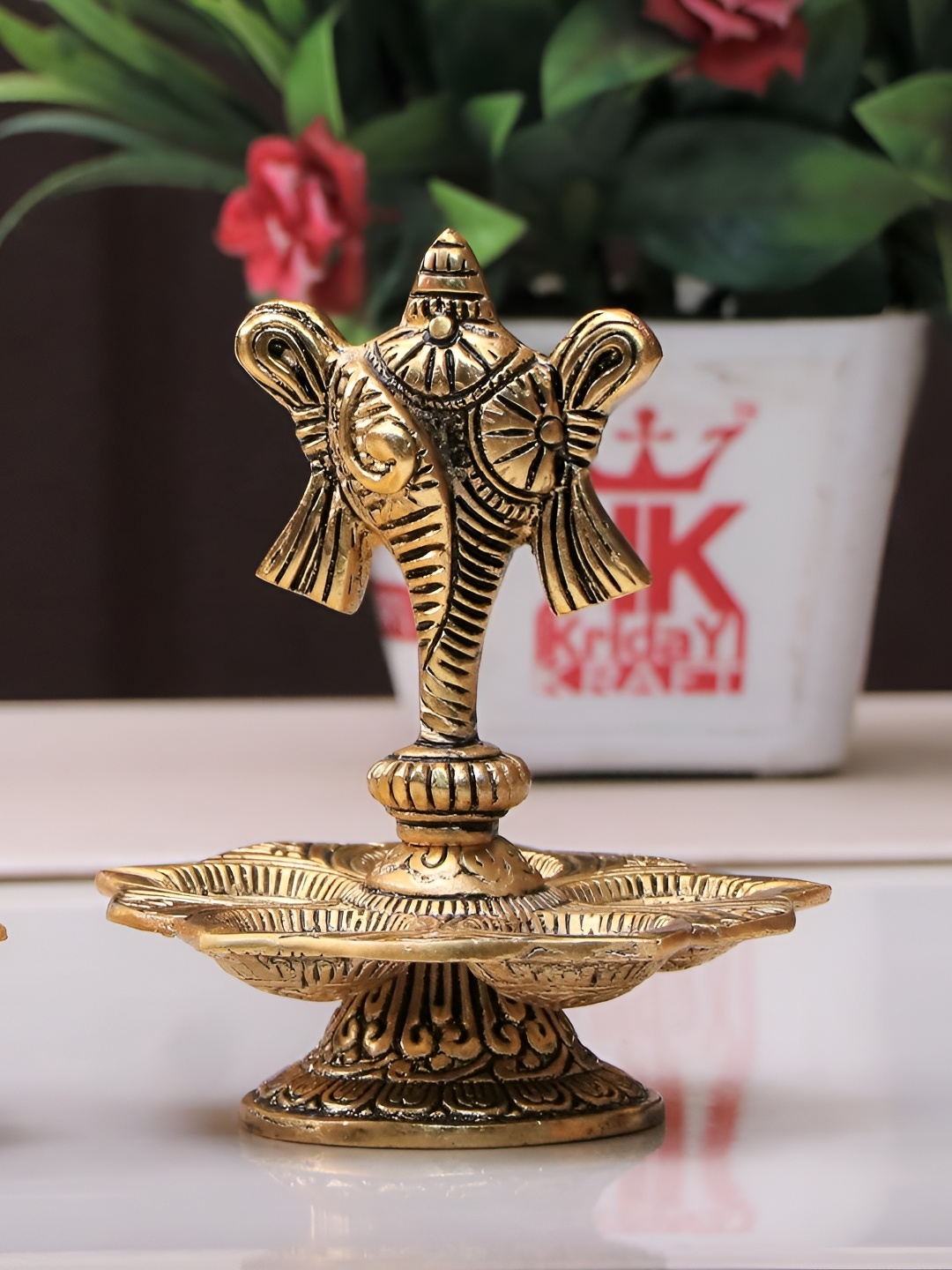 

Kridaykraft Gold Toned Metal Religious Idol Showpiece