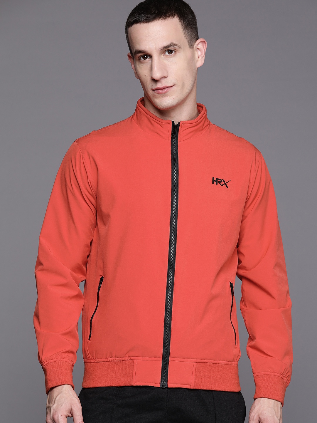 

HRX by Hrithik Roshan Men Lightweight Sporty Jacket, Orange