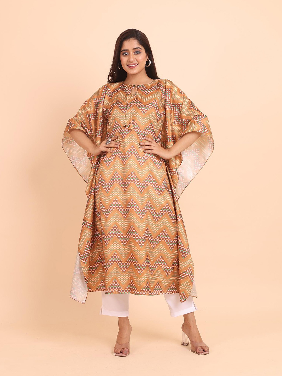 

Disli Abstract Printed Regular Tie-Up Neck Cap Sleeves Kaftan Kurta with Palazzos, Yellow