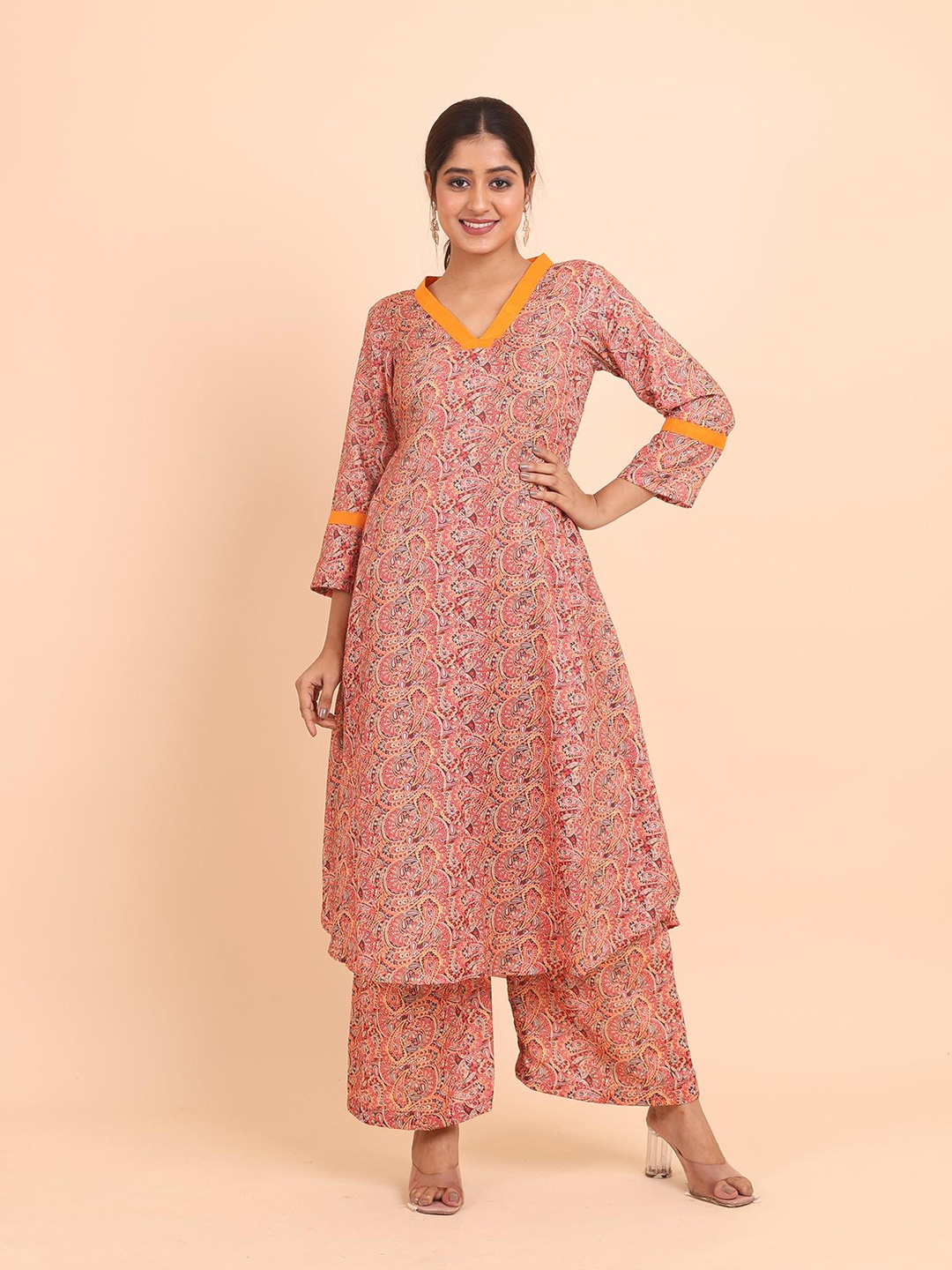 

Disli Ethnic Motifs Printed Regular V-Neck A-Line Kurta with Palazzos, Orange