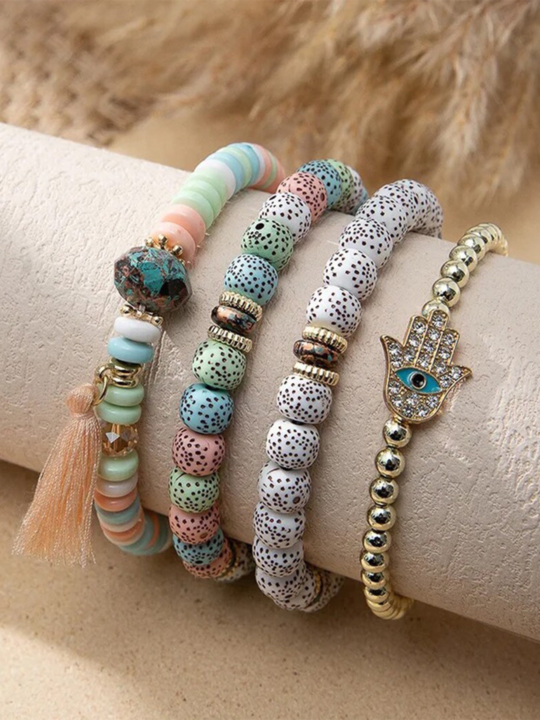 

Shining Diva Fashion Set Of 4 Gold-Plated Charm Bracelet