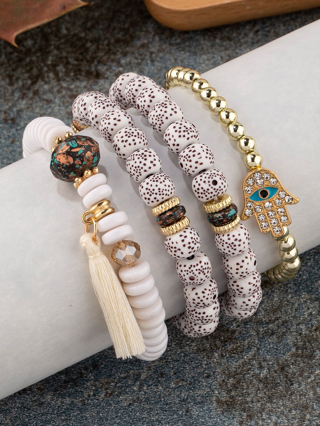 

Shining Diva Fashion Set Of 4 Beige Gold-Plated Charm Bracelet