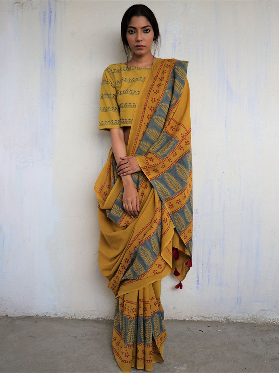 

NIKHILAM Ethnic Motifs Printed Pure Cotton Ikat Saree, Mustard