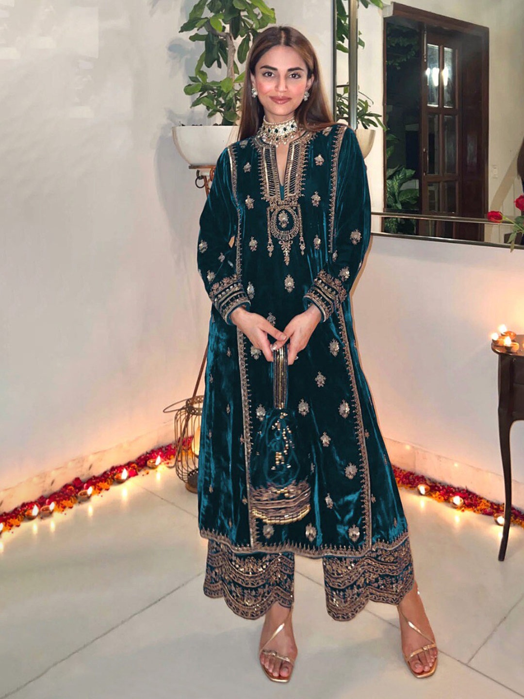 

KALINI Teal Embroidered Velvet Unstitched Dress Material