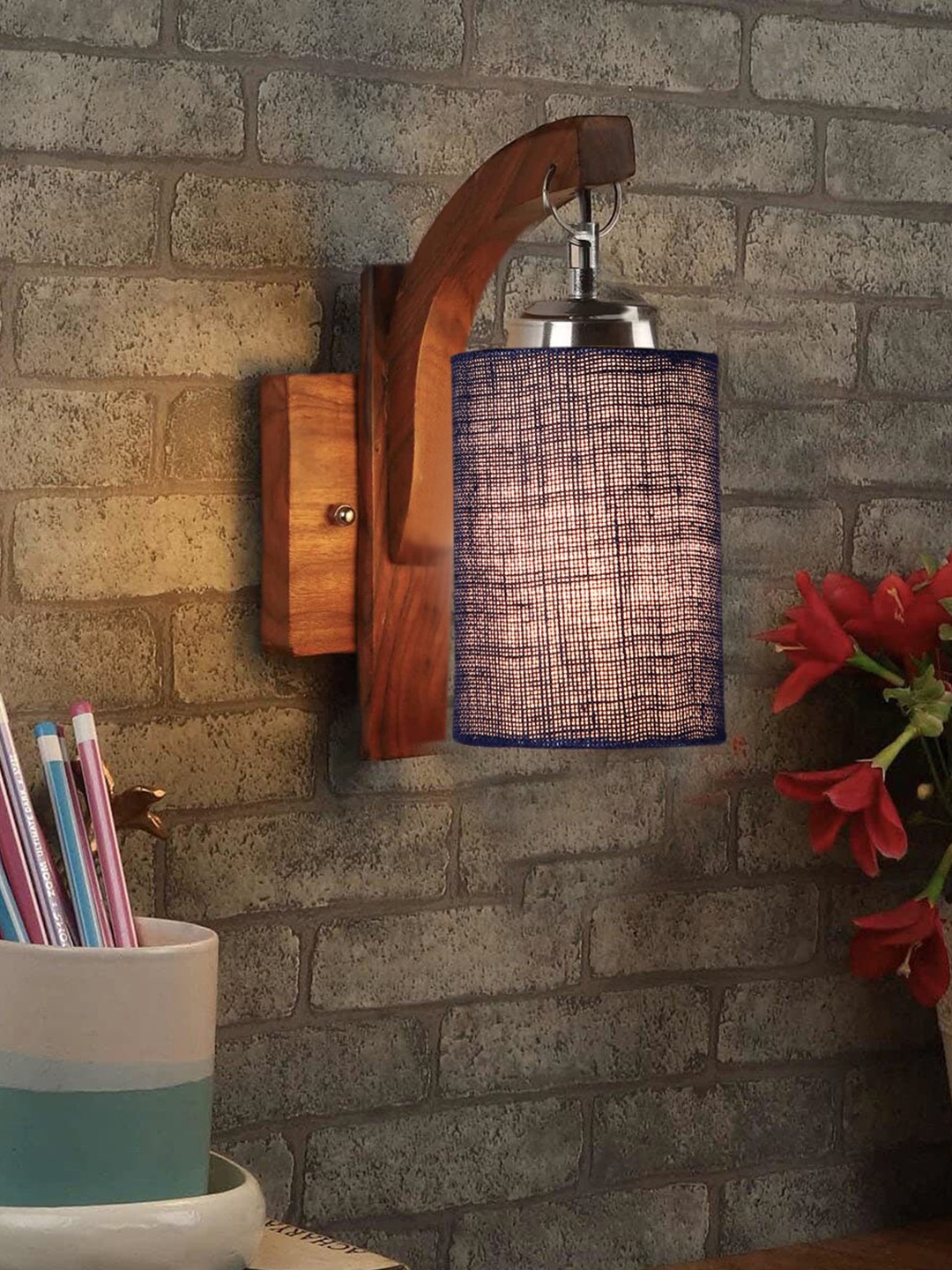 

Devansh Blue & Brown Wooden Cylinder Shaped Wall Lamp