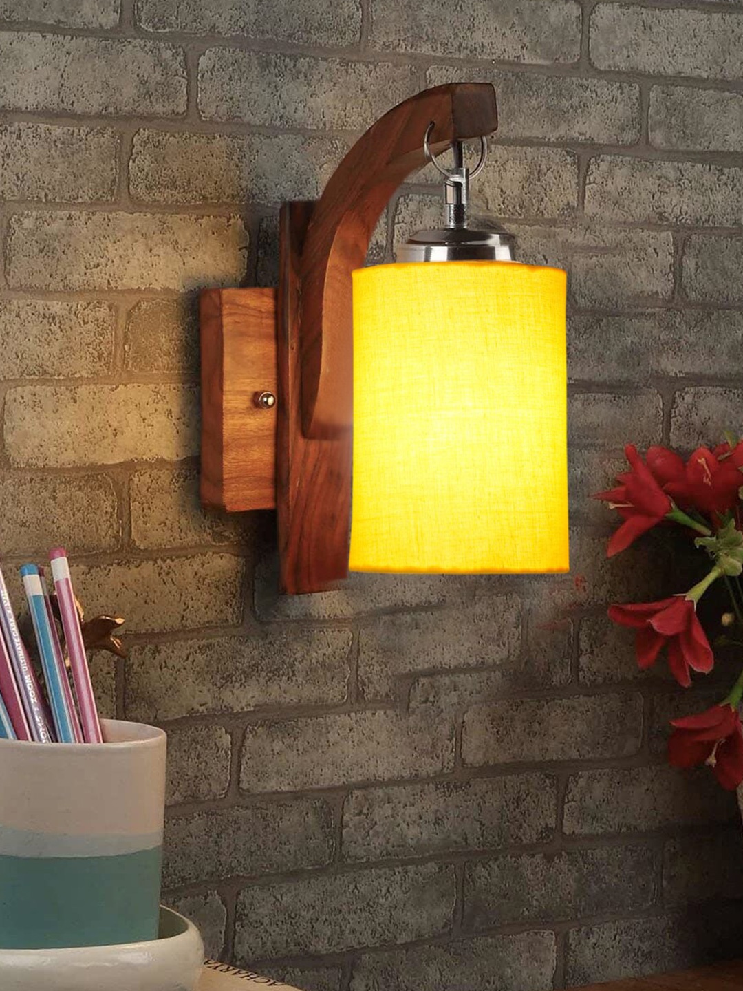 

Devansh Yellow & Brown Wooden Cylinder Shaped Wall Lamp