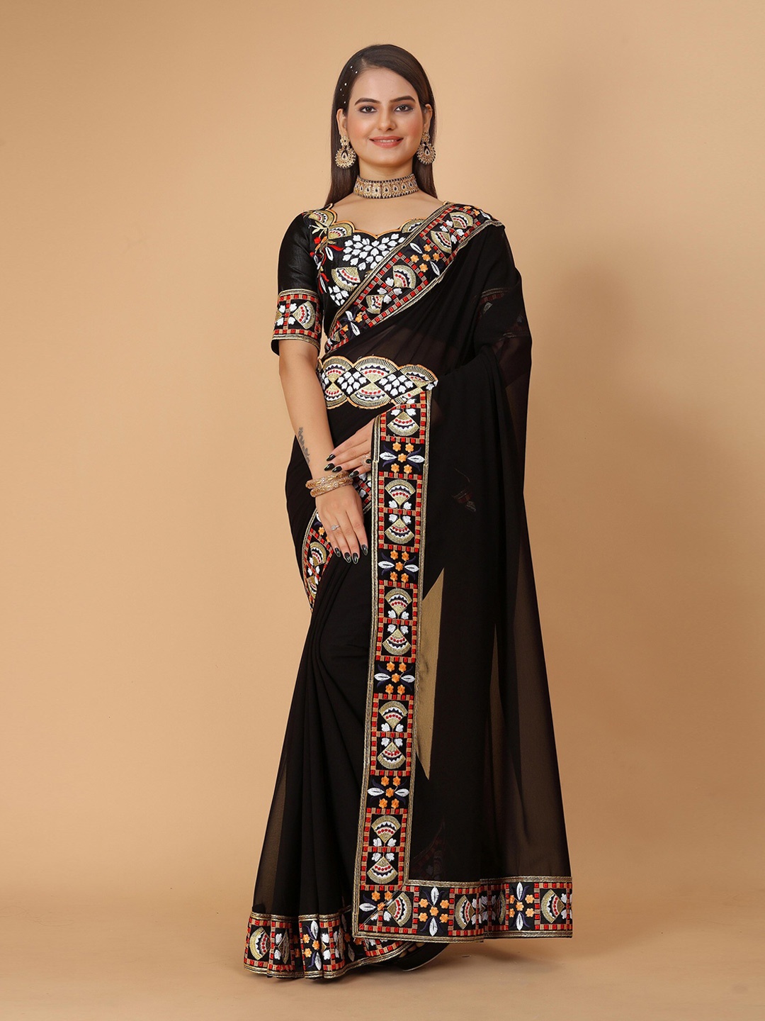 

DRIZOMIZ Embroidered Pure Georgette Ikat Saree With Waist Belt, Black