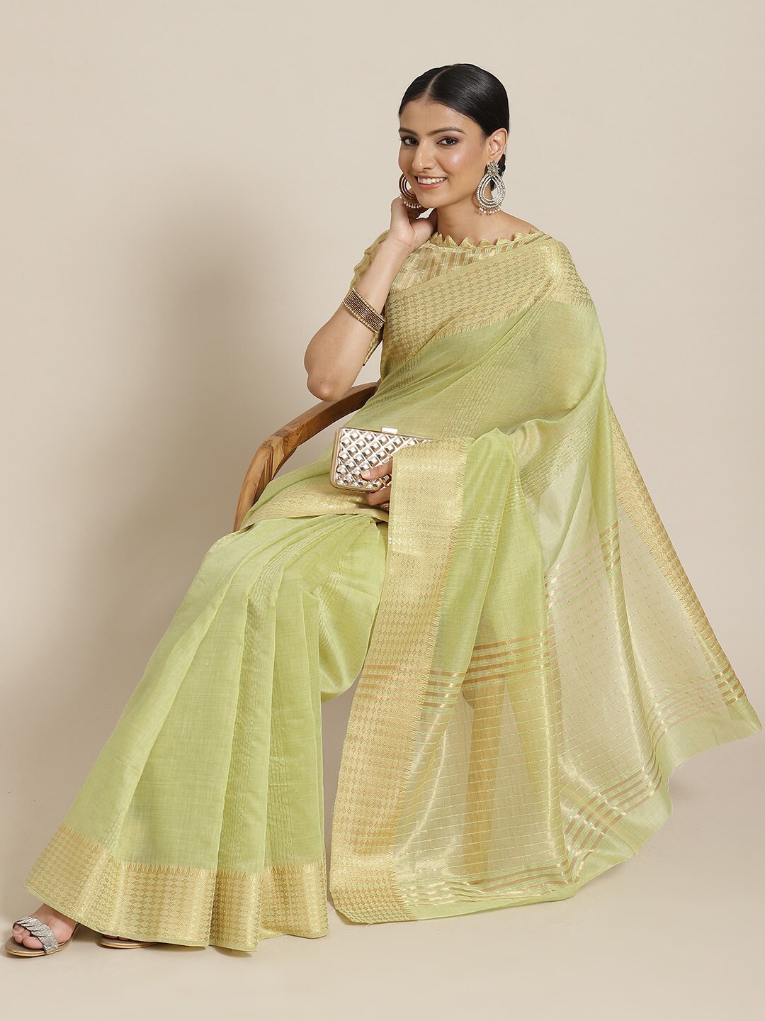 

Mitera Green Geometric Woven Design Sequinned Silk Cotton Banarasi Saree