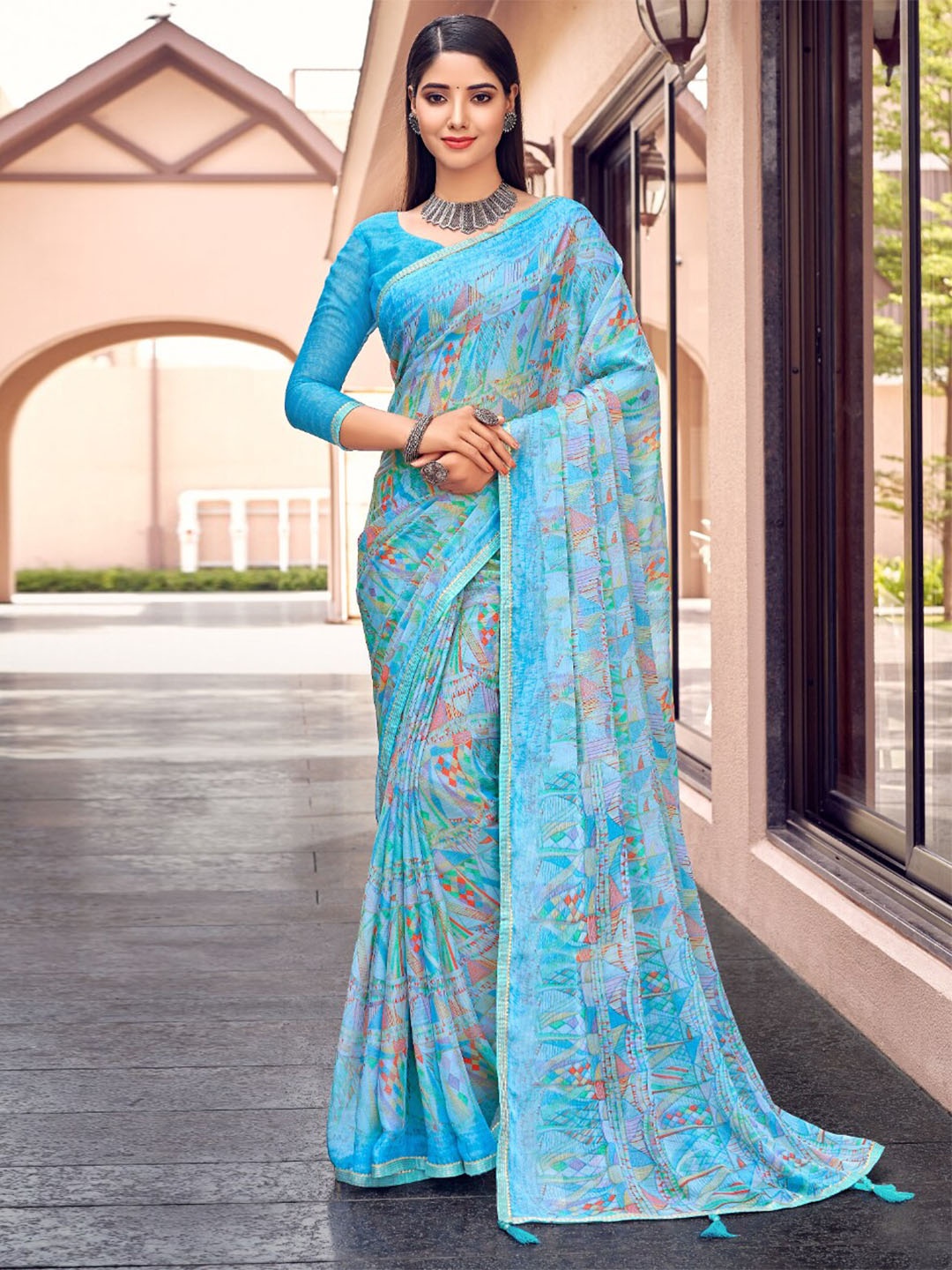 

Reboot Fashions Abstract Printed Embellished Maheshwari Pure Chiffon Saree, Blue