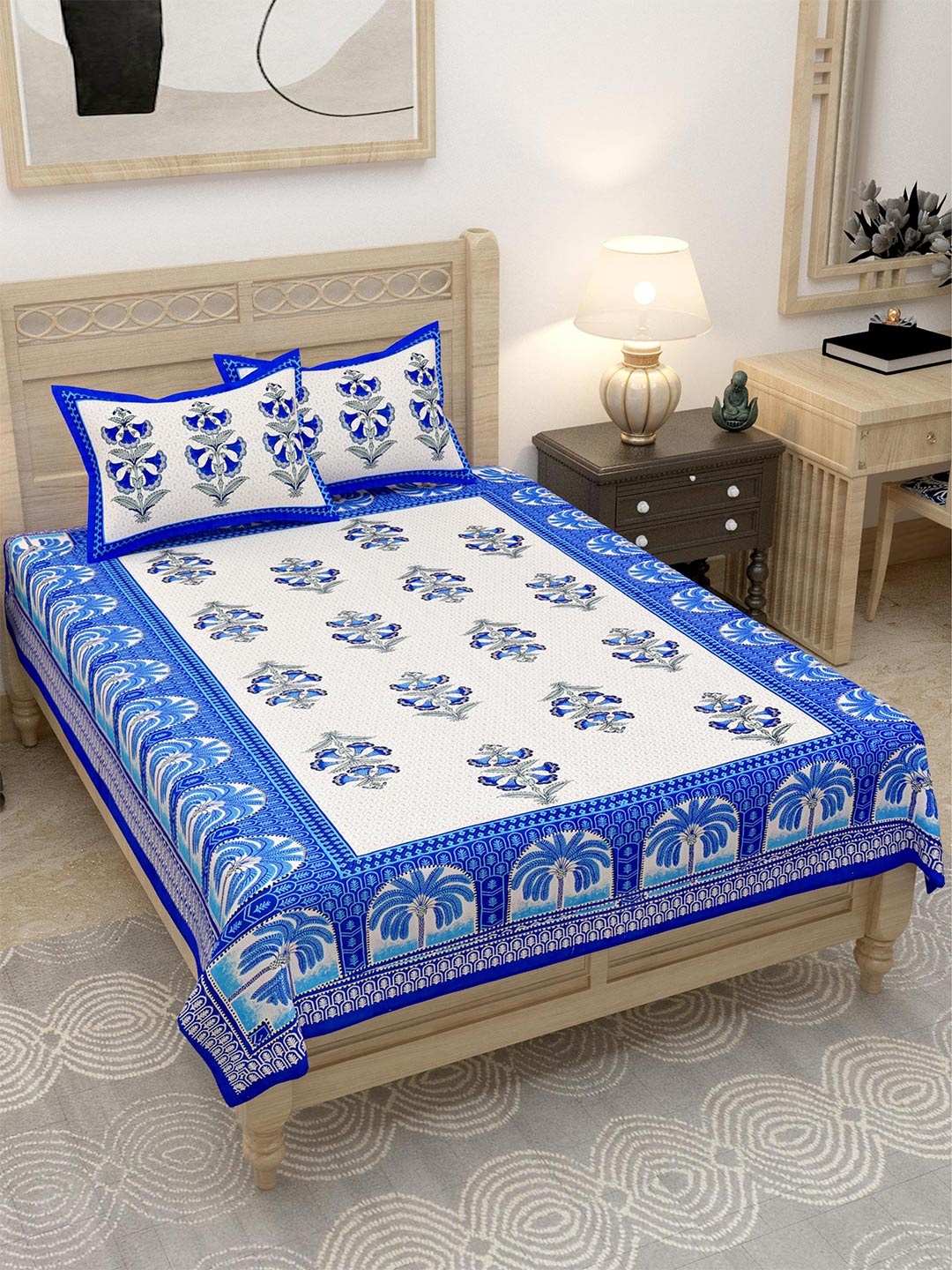 

Lali Prints Blue & White Floral 144 TC Single Bedsheet with 2 Pillow Covers