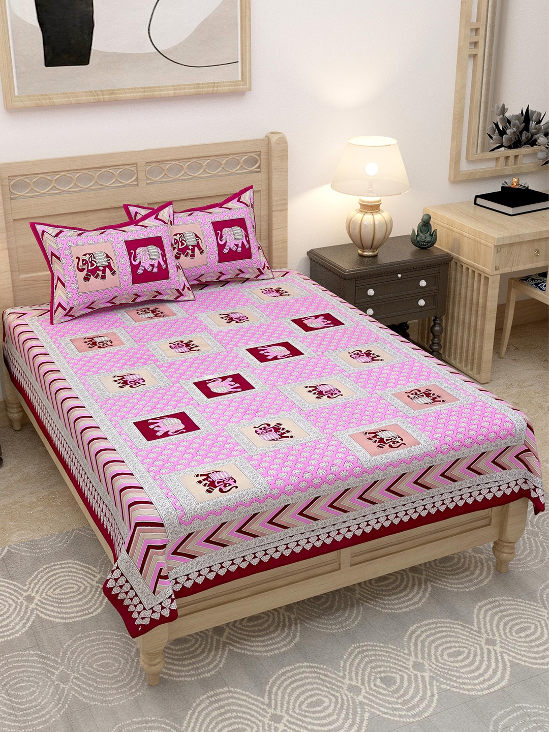 

Lali Prints Pink & White Elephant Motifs 144 TC Single Bedsheet with 2 Pillow Covers