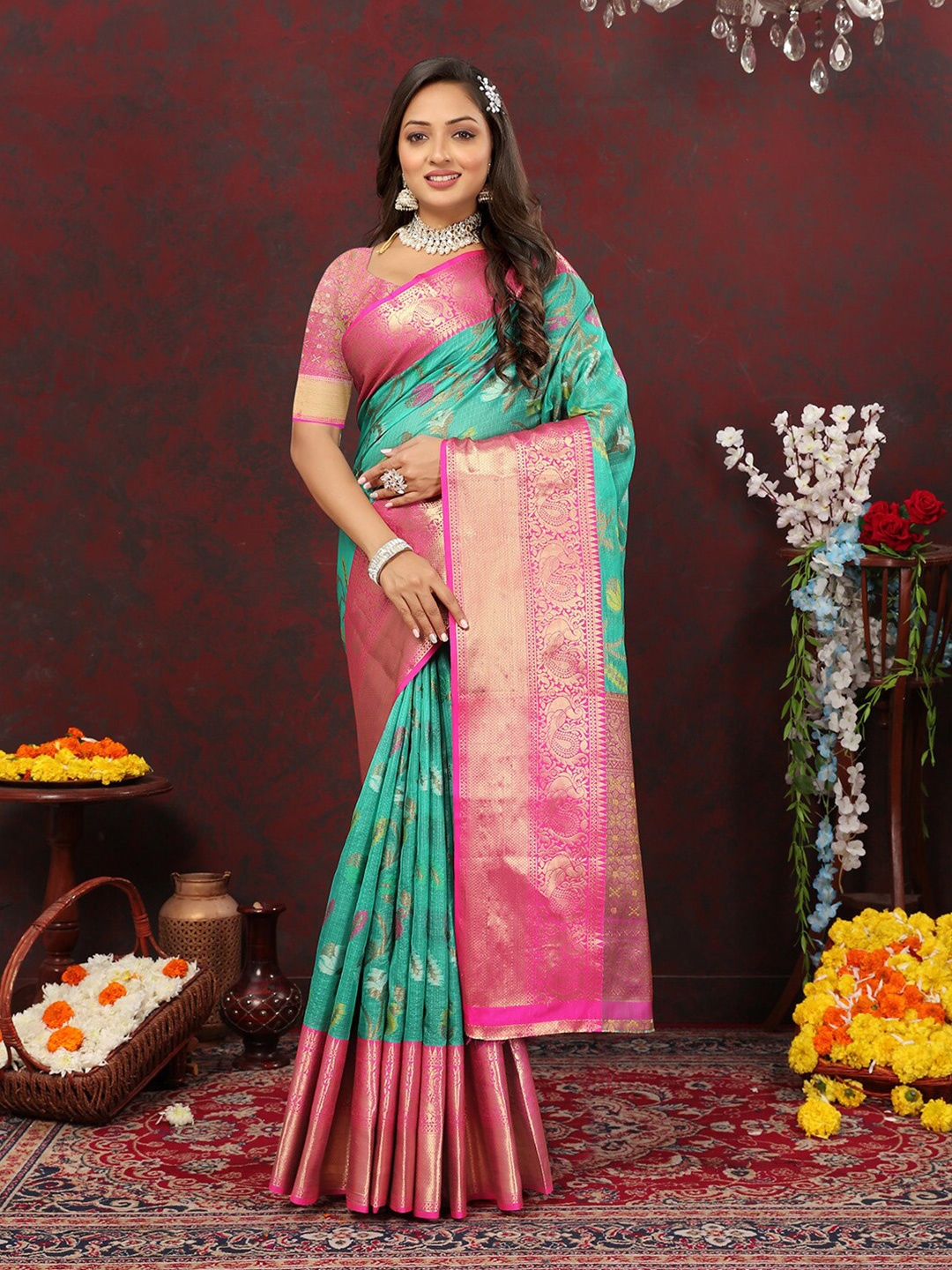 

KALINI Teal Ethnic Motifs Woven Design Zari Cotton Patola Saree