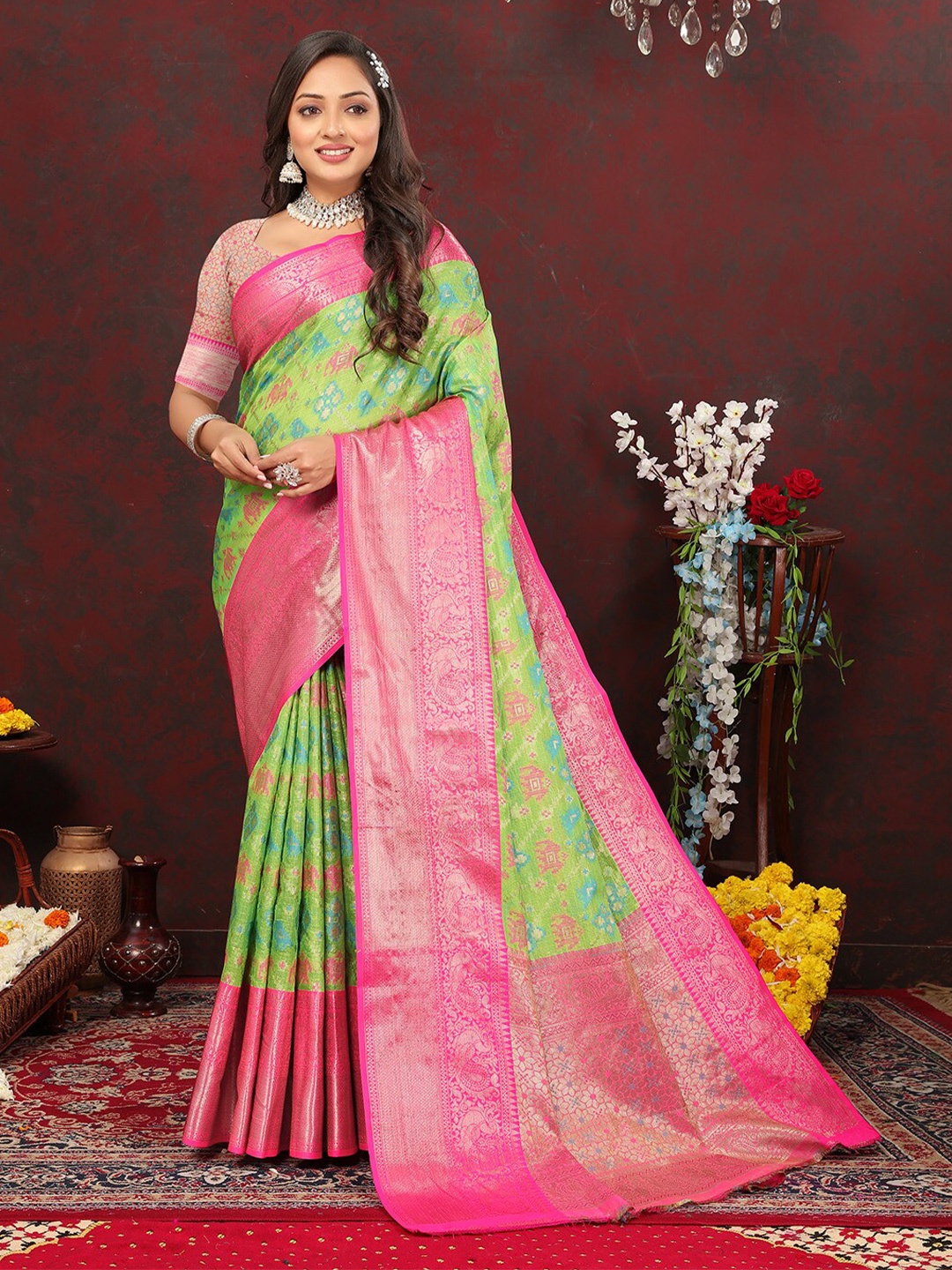 

KALINI Green Woven Design Zari Cotton Patola Saree