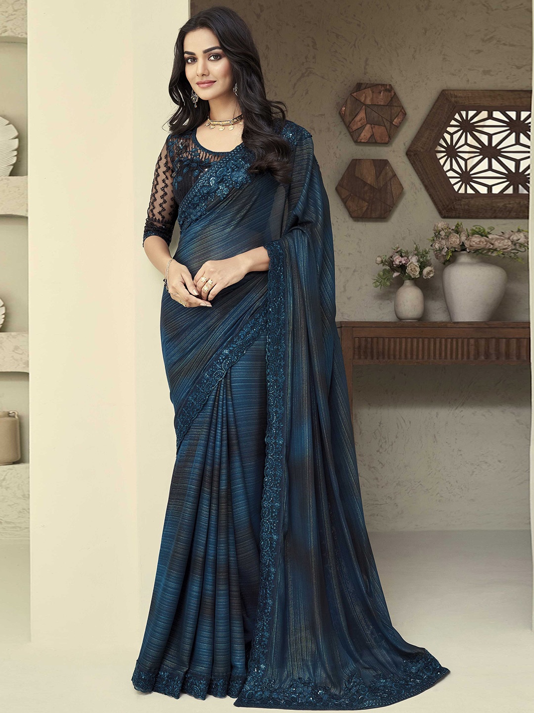 

Mitera Teal Striped Sequinned Embellished Saree
