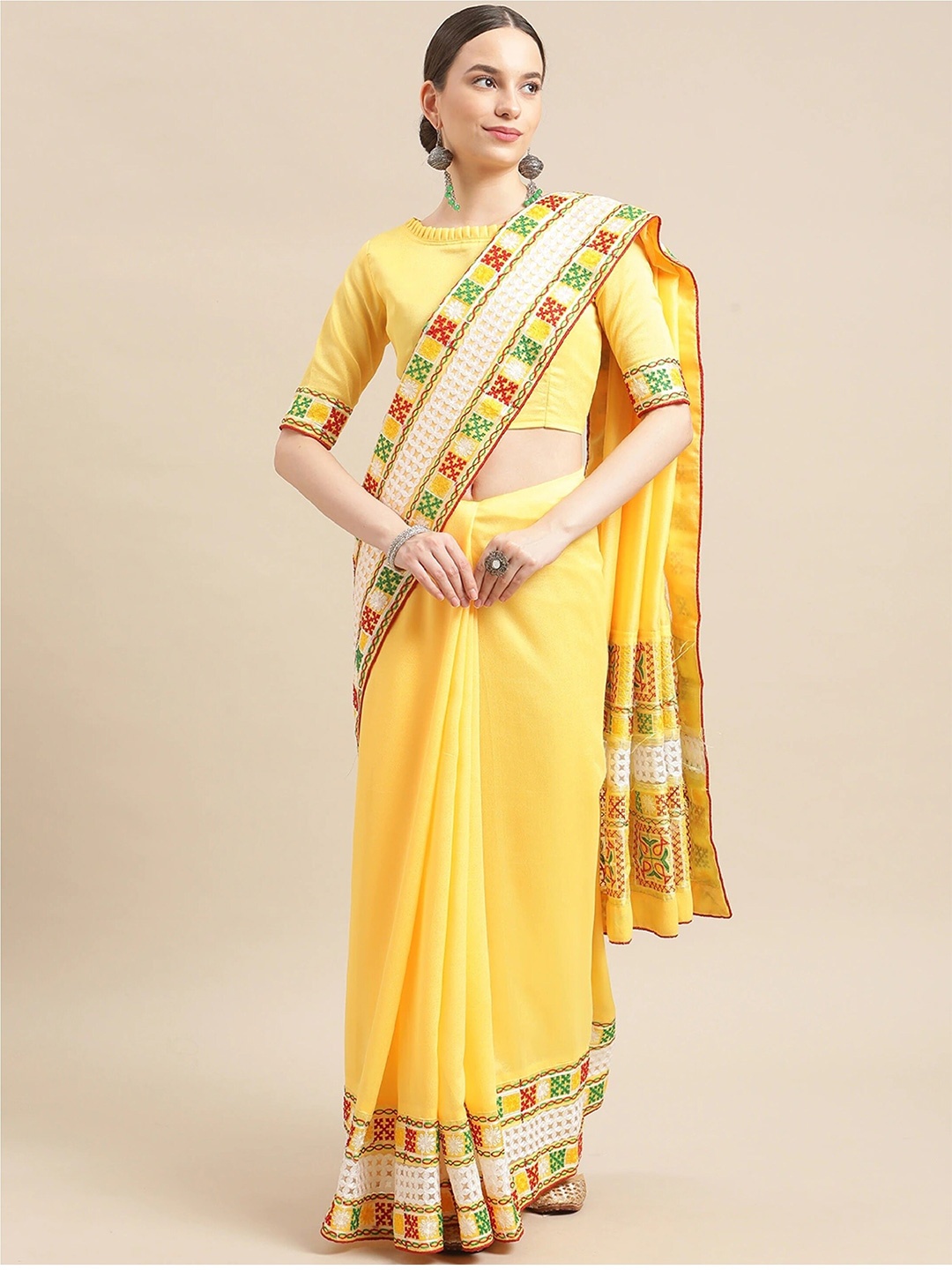 

Mitera Yellow Geometric Kutchi Embroidered Saree