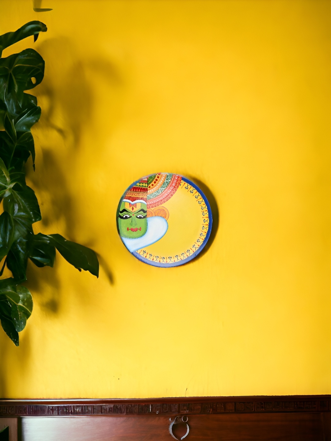 

THE COCOTIER Yellow & Green Kathakali Face Printed Wall Plate
