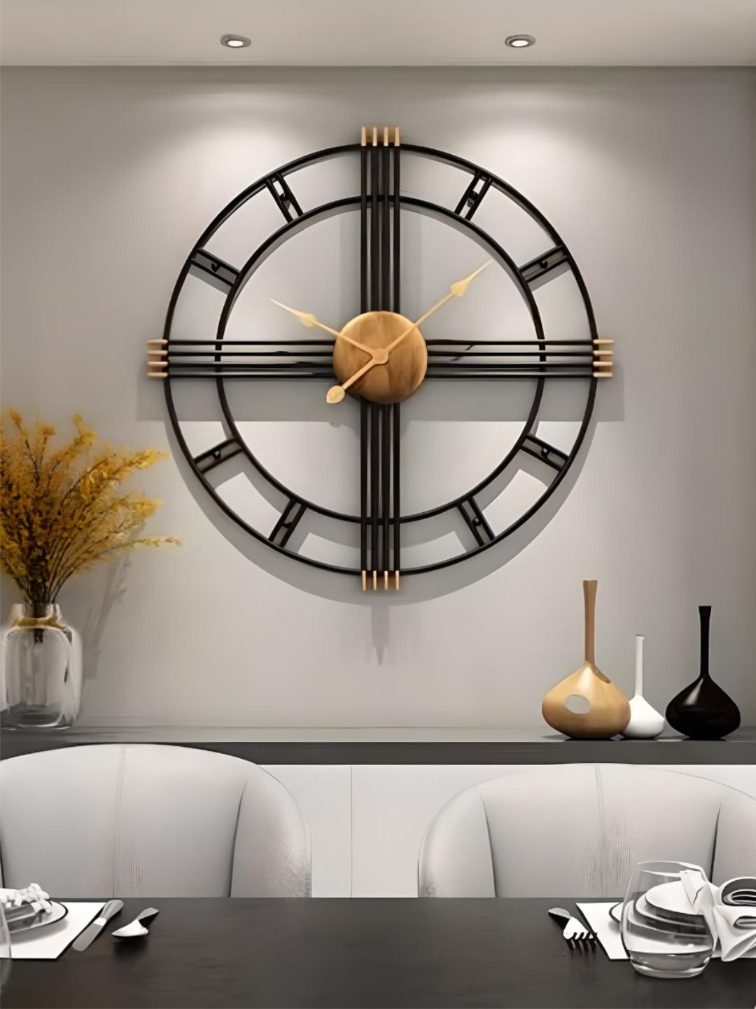 

The Art House Black & Gold Toned Round Shaped Wall Clock