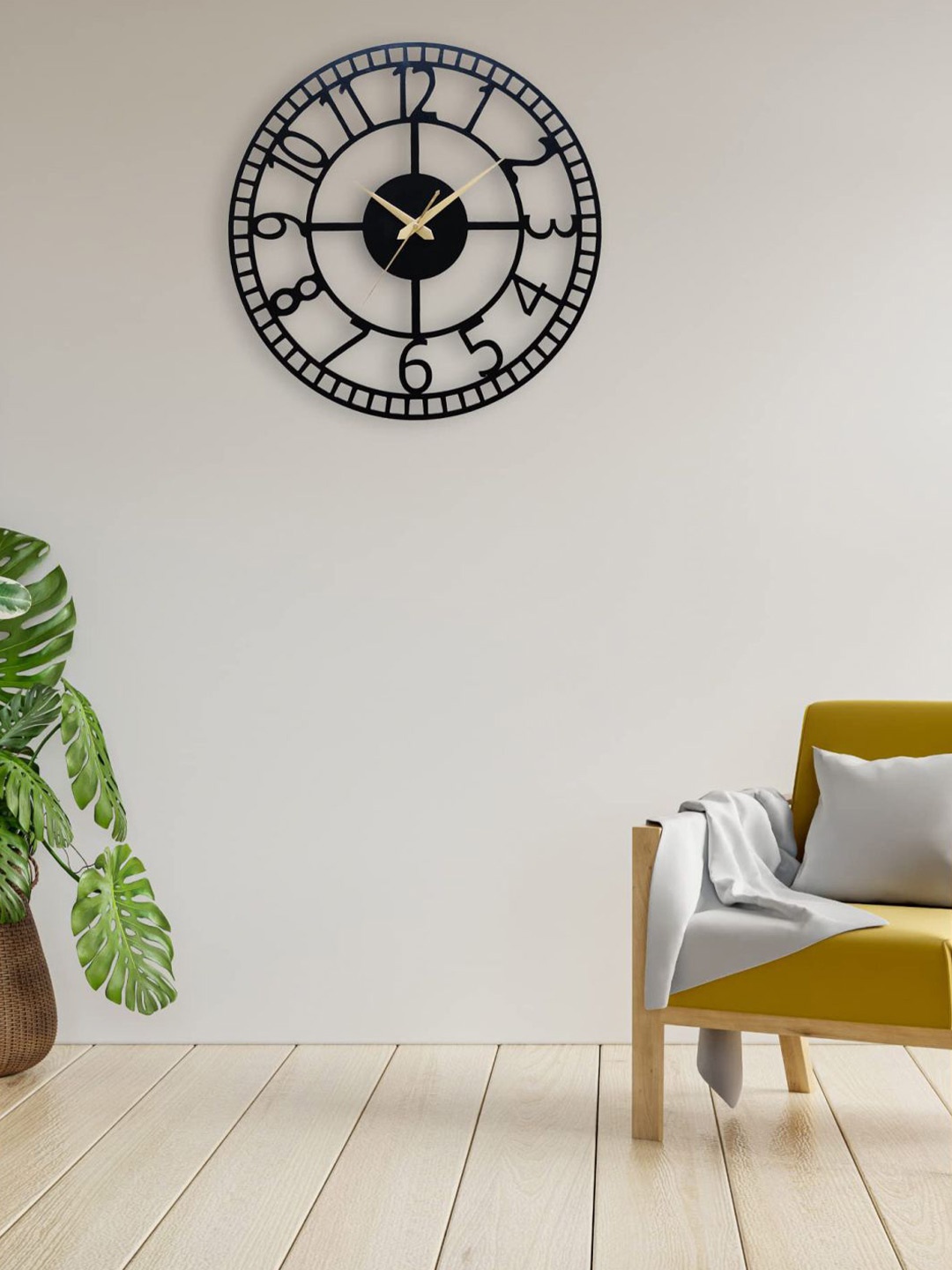 

The Art House Black Metal Round Shaped Wall Clock