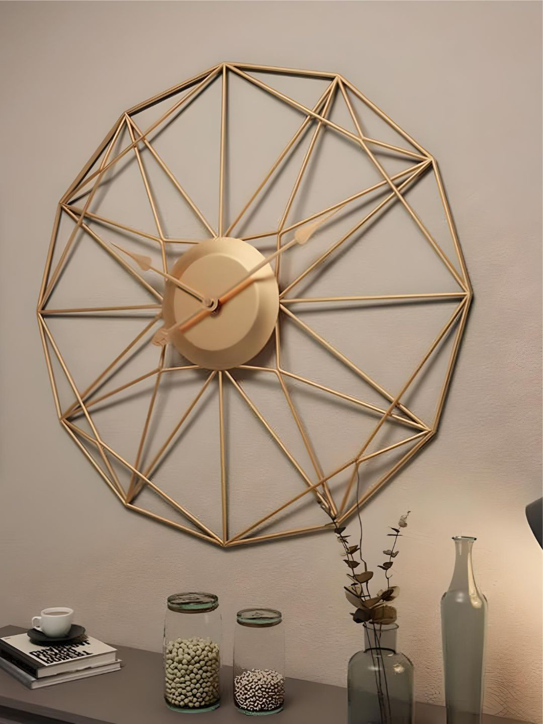 

The Art House Gold Toned Metal Abstract Shaped Wall Clock