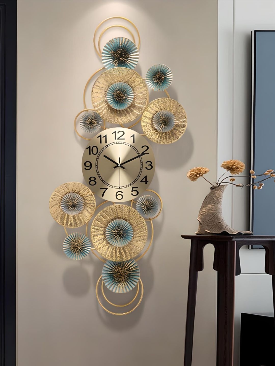 

The Art House Gold Toned Textured Metal Abstract Shaped Wall Clock