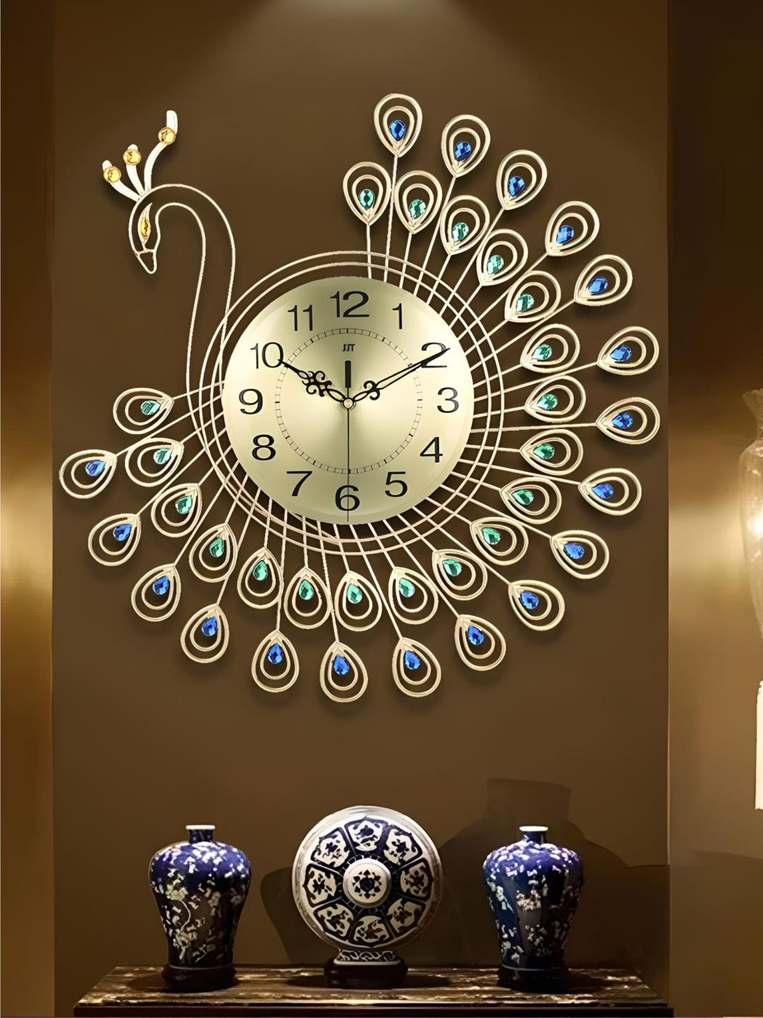 

The Art House Gold Toned & Blue Metal Abstract Shaped Wall Clock