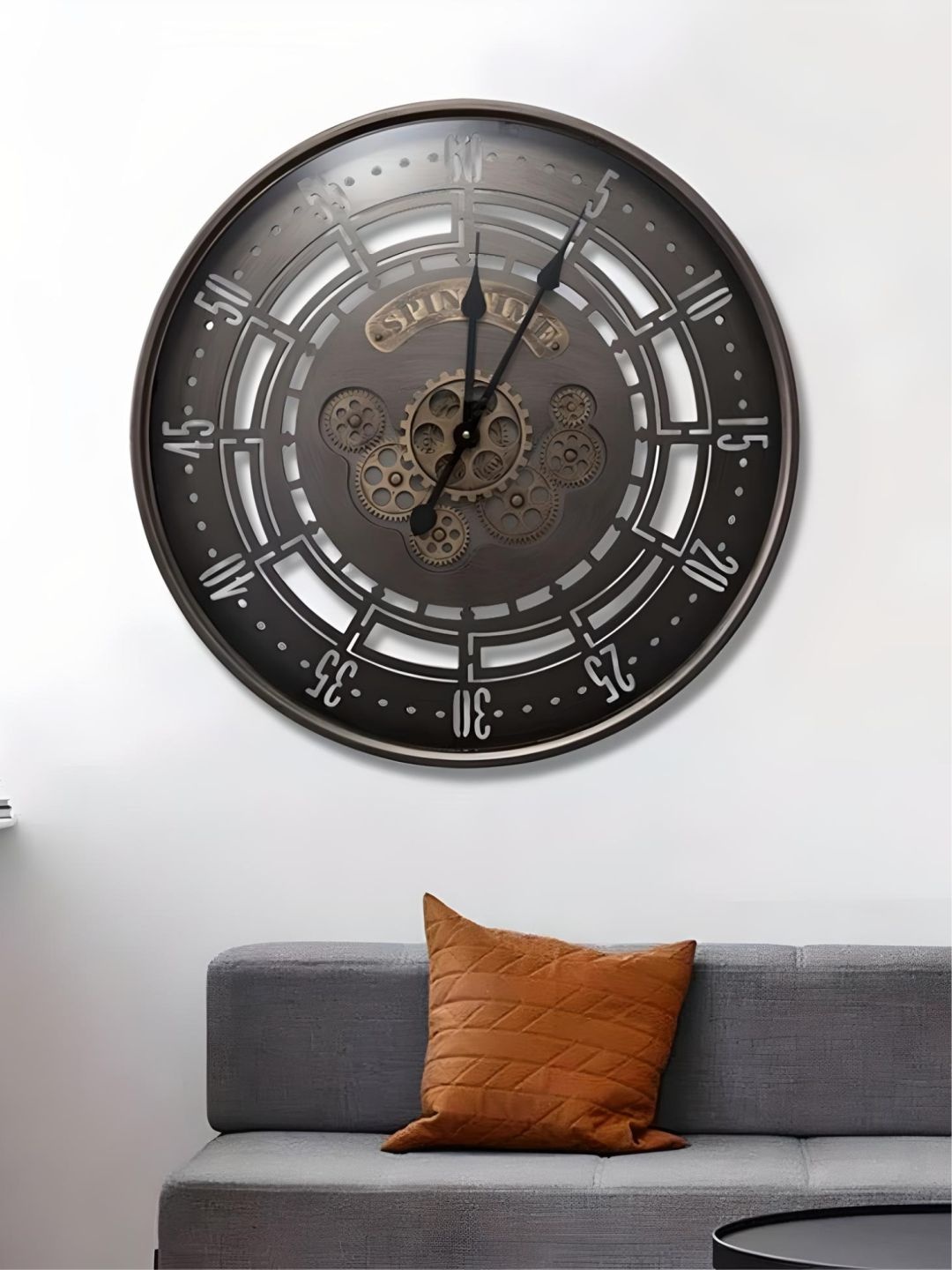 

The Art House Black & White Printed Metal Round Shaped Wall Clock