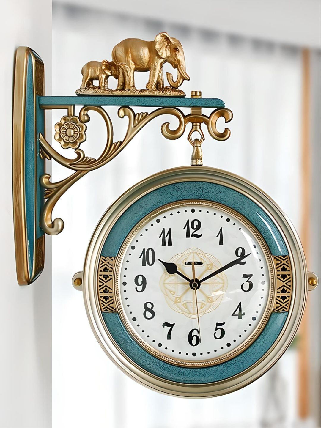 

The Art House Gold Toned & White Printed Metal Round Shaped Wall Clock