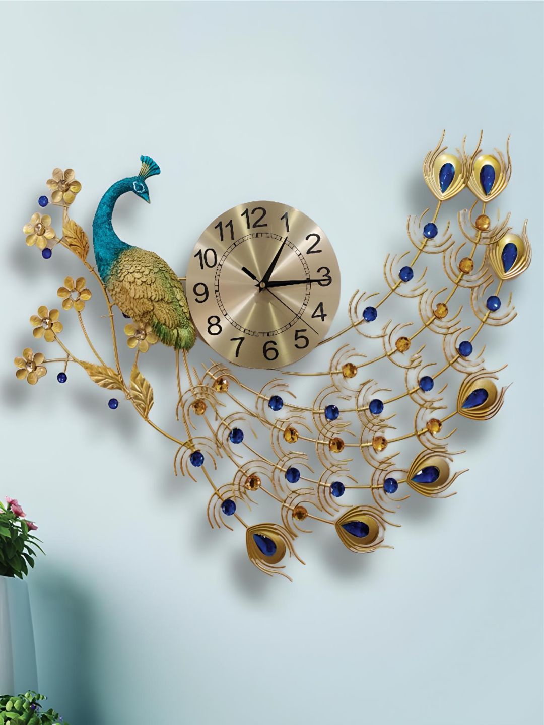 

The Art House Gold Toned & Blue Textured Metal Abstract Shaped Wall Clock