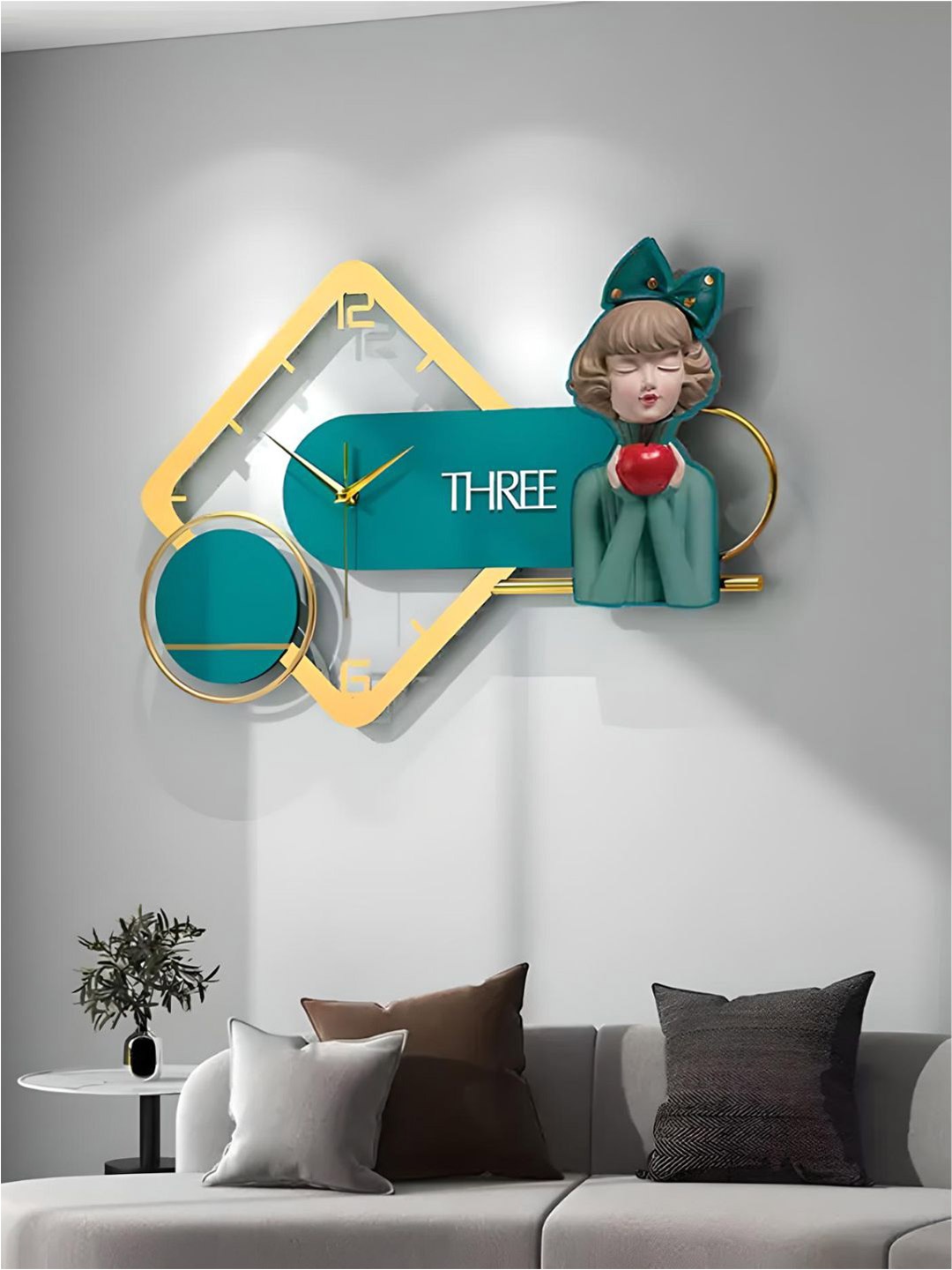 

The Art House Gold Toned & Blue Printed Metal Abstract Shaped Wall Clock