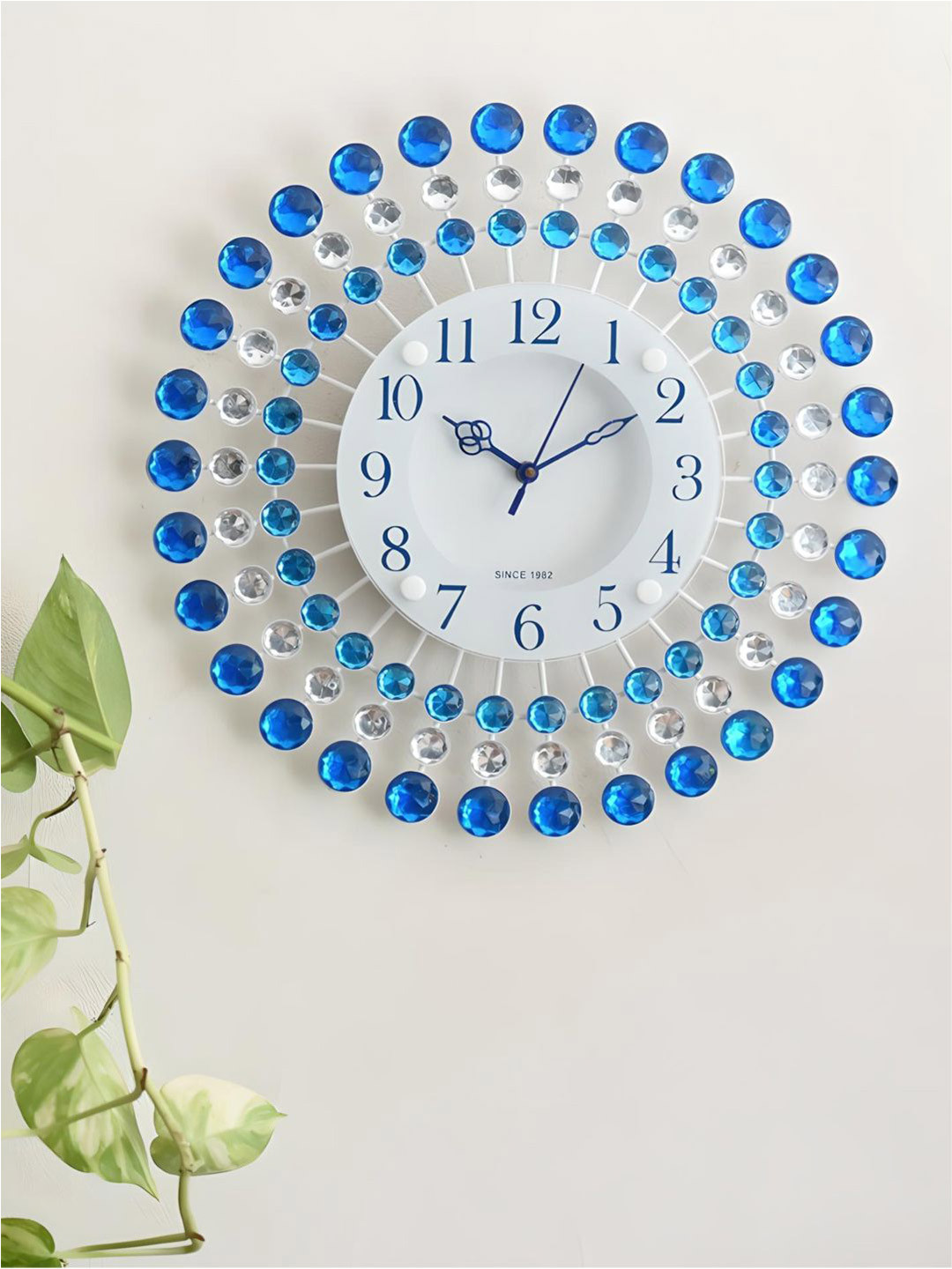 

The Art House Blue & White Textured Metal Abstract Shaped Wall Clock