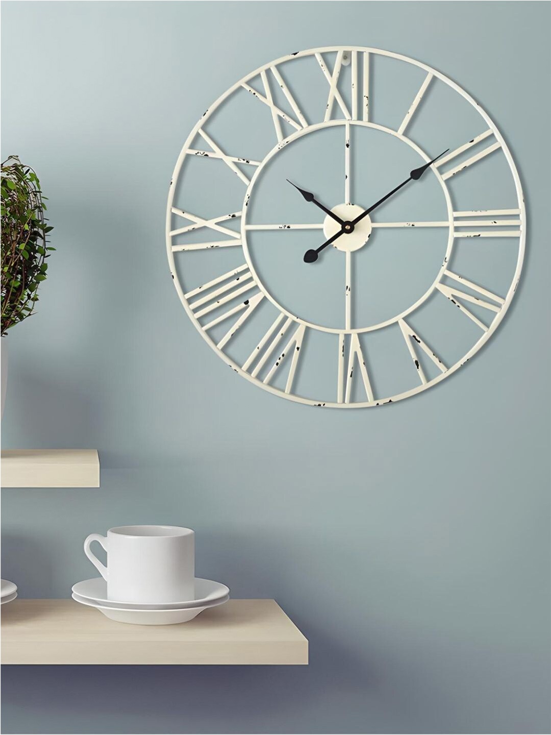 

The Art House White & Black Printed Round Shaped Metal Wall Clock