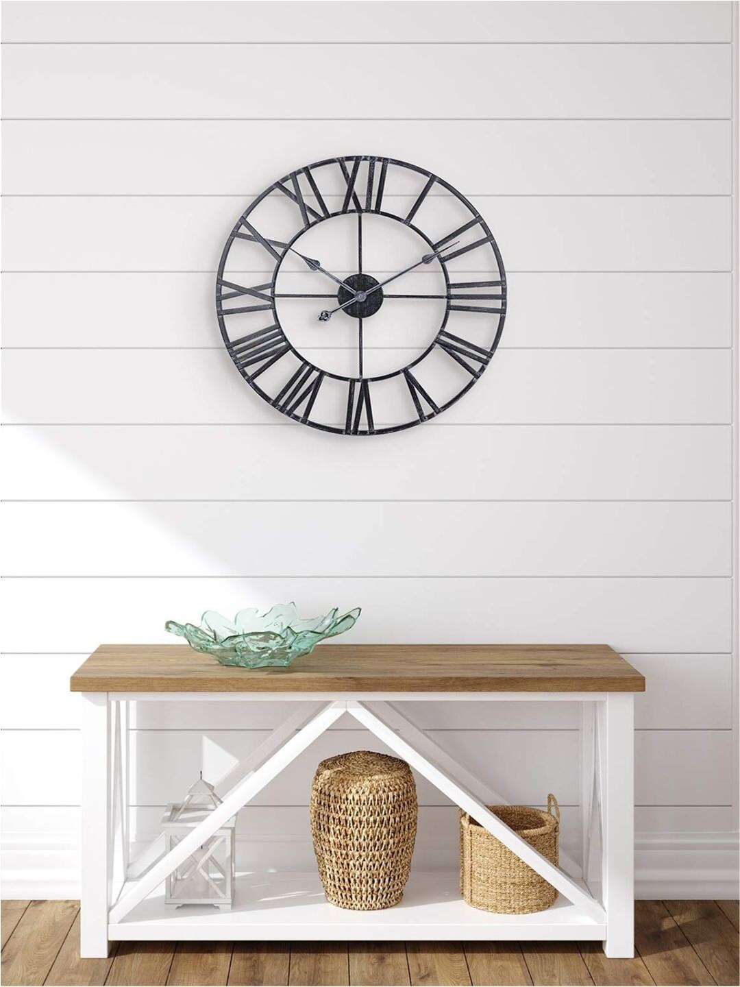 

The Art House Black Round Shaped Metal Wall Clock