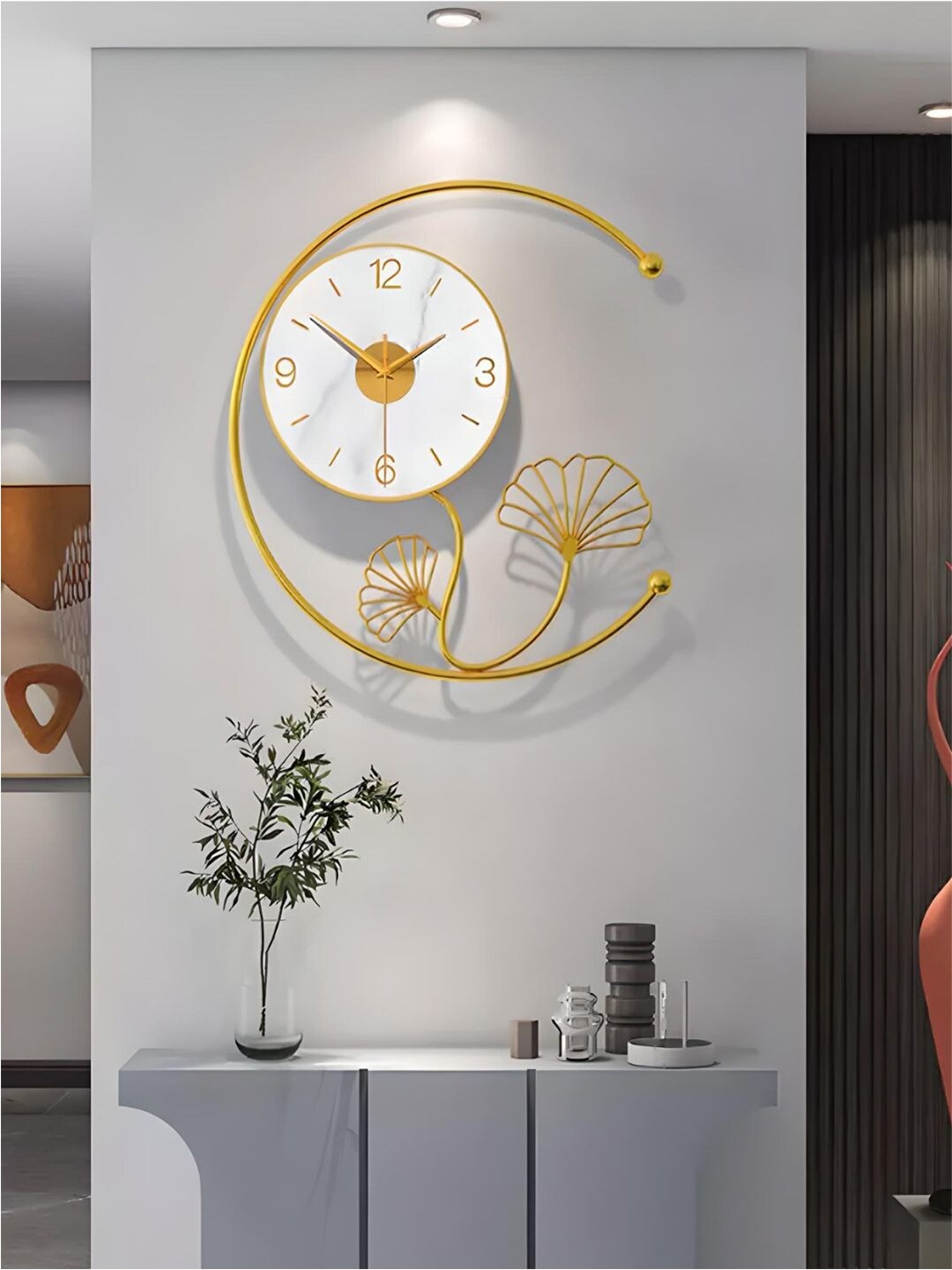 

The Art House White & Gold Toned Round Shaped Metal Wall Clock