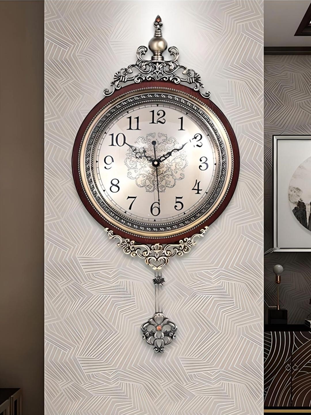 

The Art House Silver Toned & Brown Abstracl Shaped Metal Pendulum Wall Clock