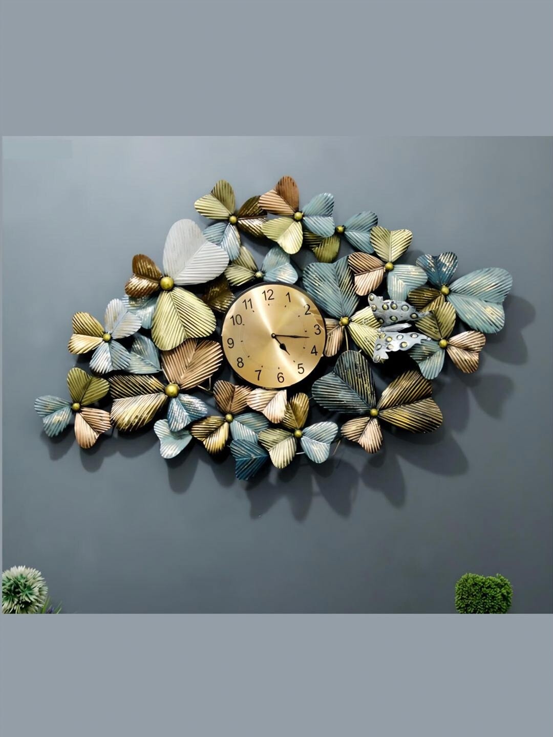 

The Art House Gold Toned & Blue Abstract Shaped Metal Wall Clock