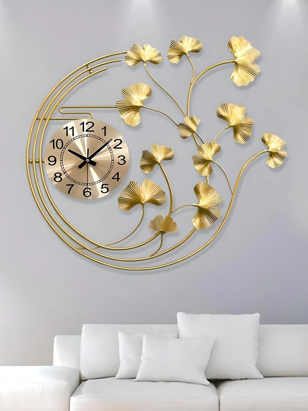 

The Art House Gold Toned & Black Abstract Shaped Metal Wall Clock