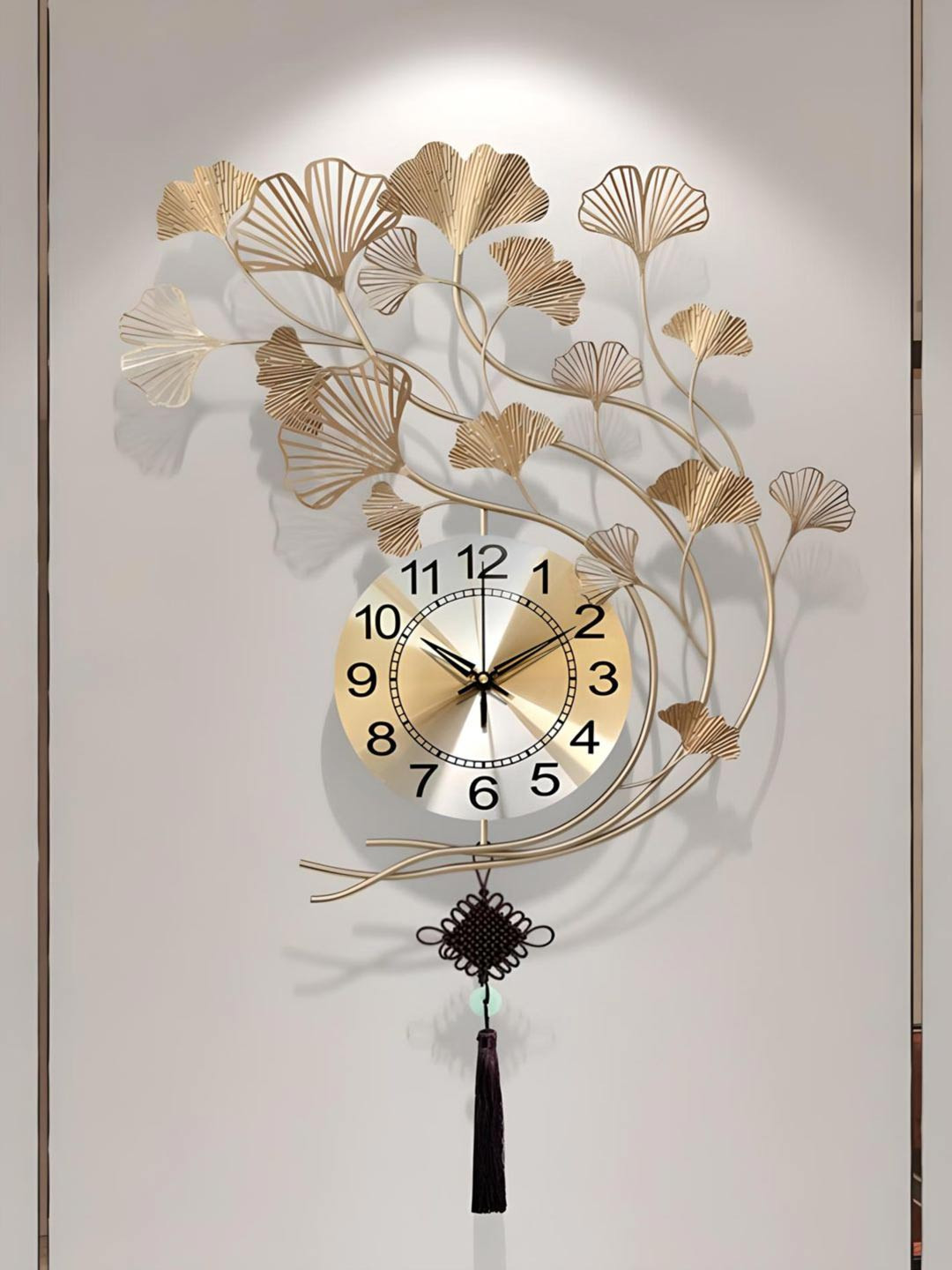 

The Art House Gold Toned & Black Textured Abstract Shaped Metal Wall Clock