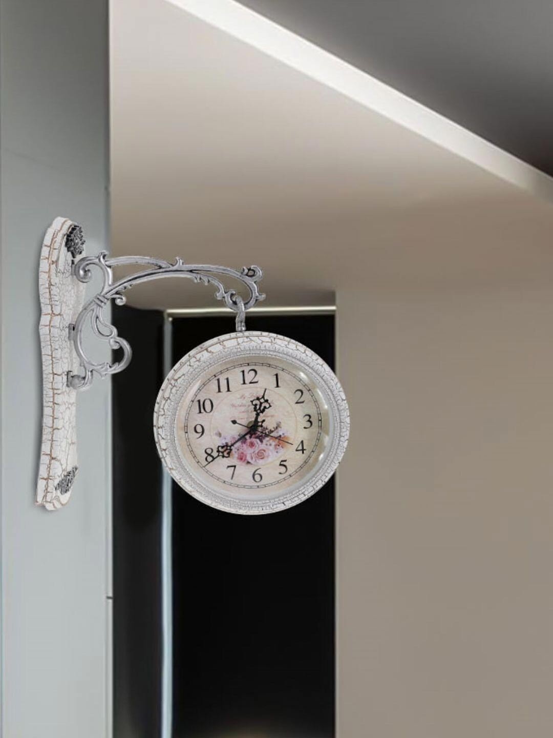 

The Art House White & Black Printed Round Shaped Metal Wall Clock