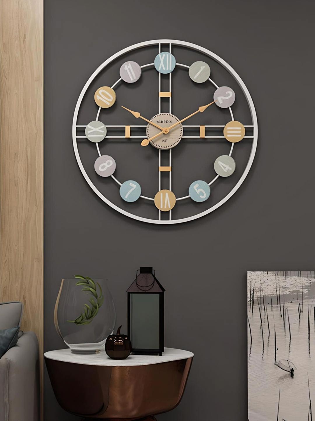 

The Art House Grey & Blue Printed Round Shaped Metal Wall Clock