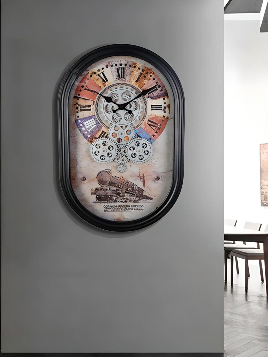 

The Art House Brown & Black Printed Oval Shaped Metal Wall Clock