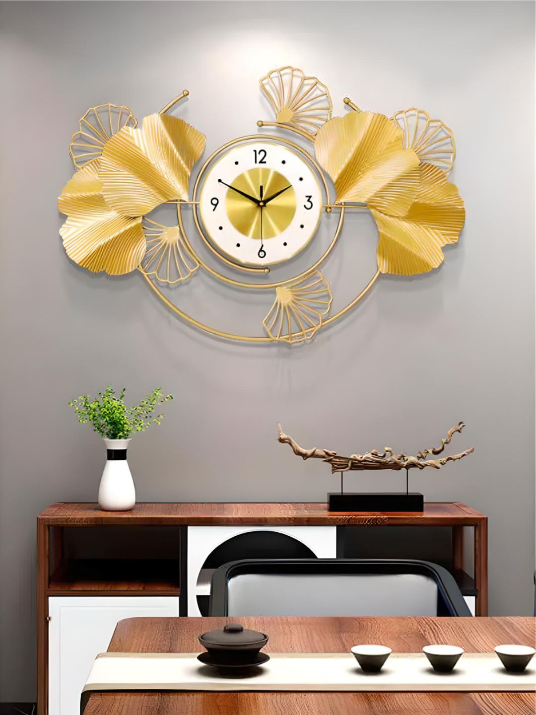 

The Art House Gold Toned & White Textured Abstract Shaped Metal Wall Clock