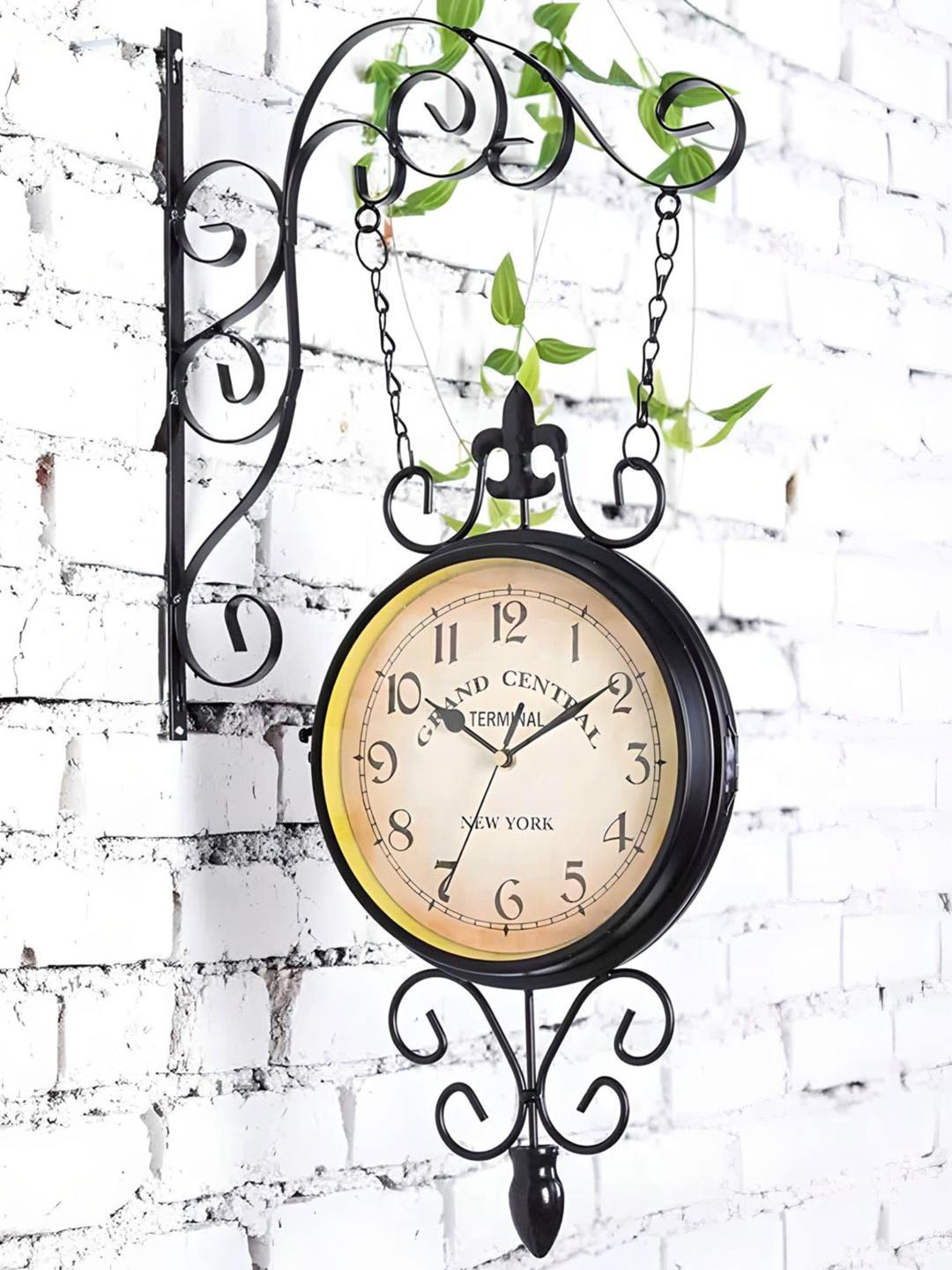 

The Art House Black & Brown Printed Round Shaped Metal Wall Clock