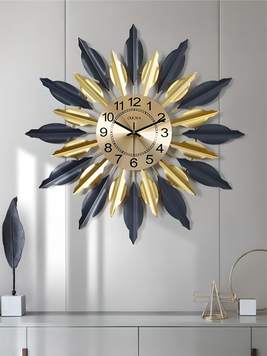 

The Art House Gold Toned & Black Textured Abstract Shaped Metal Wall Clock