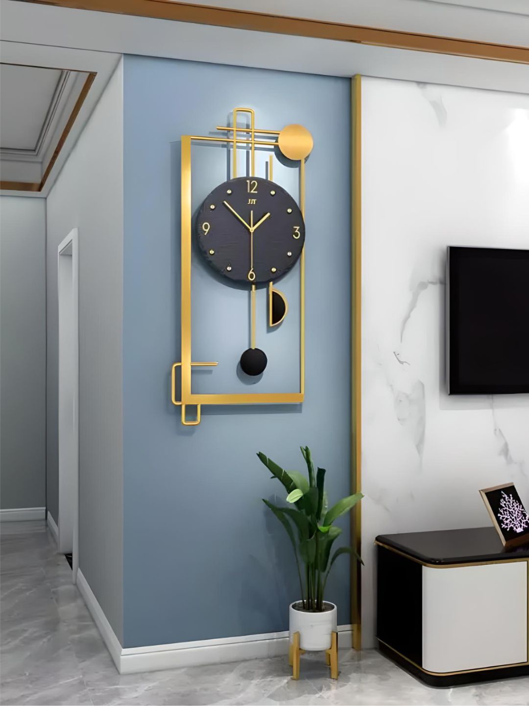 

The Art House Gold Toned & Black Abstract Shaped Pendulum Wall Clock