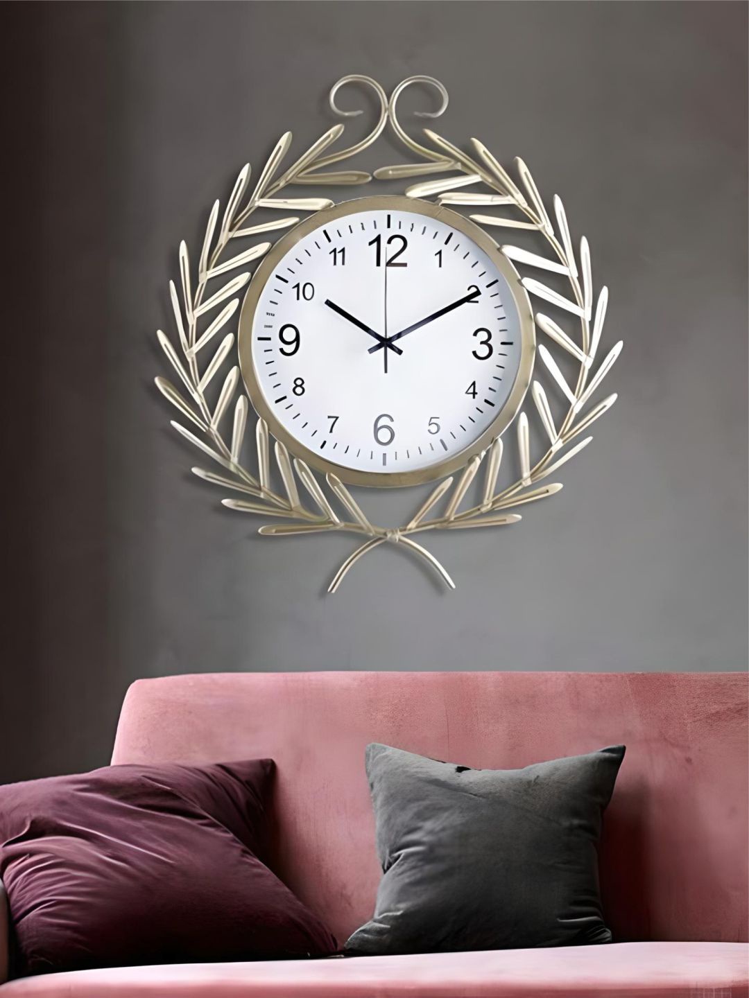 

The Art House Gold Toned & White Round Shaped Metal Wall Clock