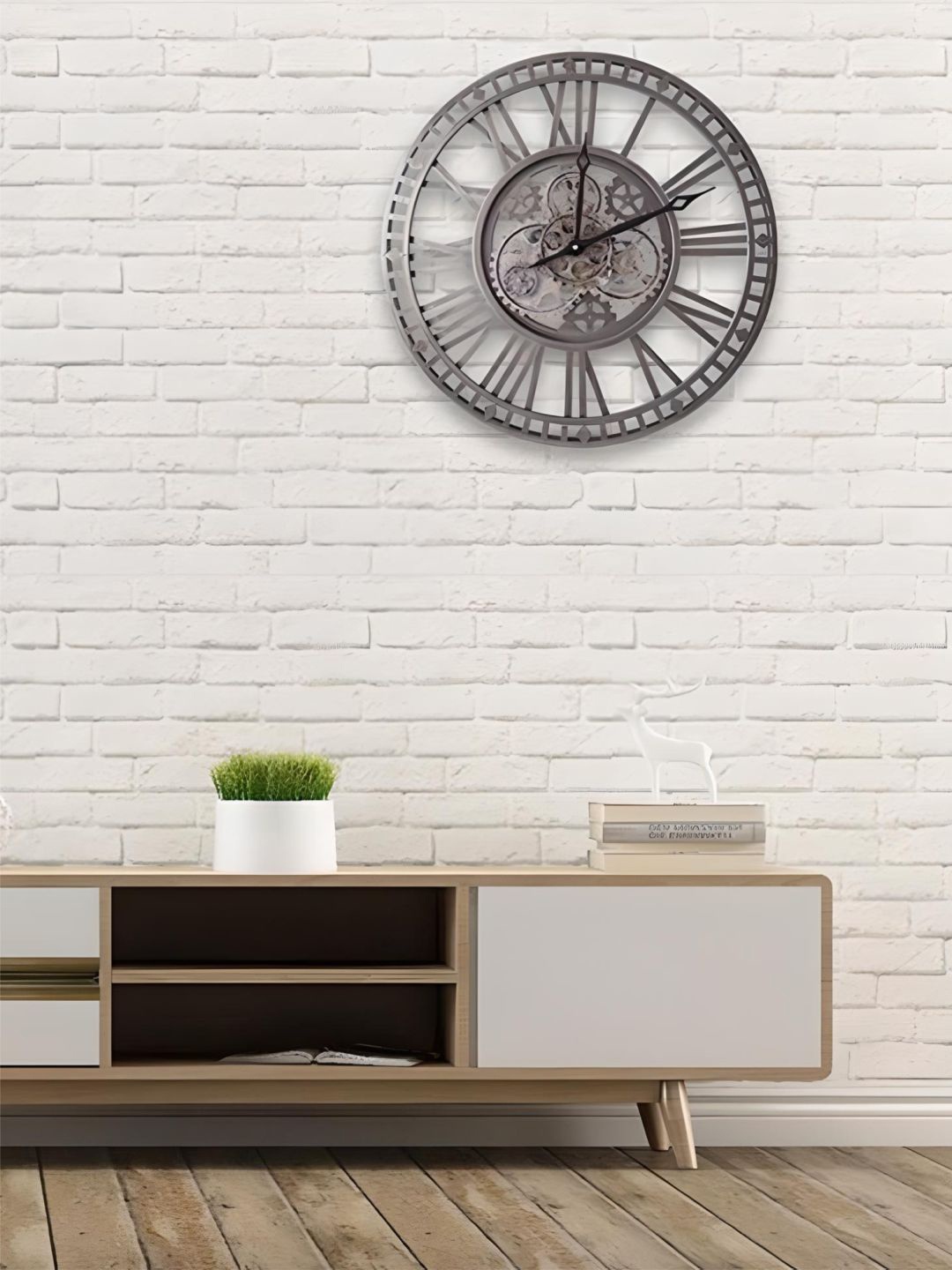 

The Art House Metallic & Black Textured Round Shaped Contemporary Wall Clock